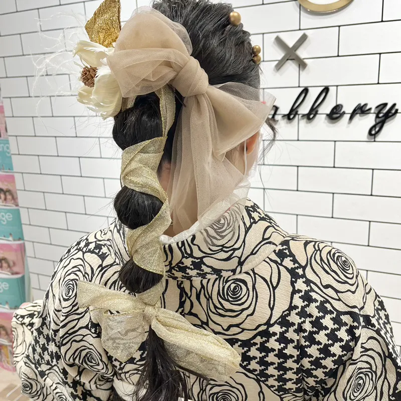 卒業式袴レンタル店アンジュを利用したお客様の写真「髪型・ヘアアレンジ・ヘアセット・玉ねぎポニー×リボンアレンジ」